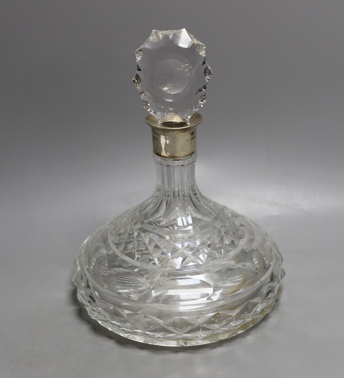 A modern silver mounted cut glass ships decanter with stopper, London, 1973, height 26.2cm.
